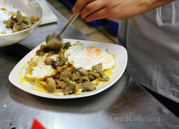 Huevos revueltos con setas y parmesano de Il Nonno